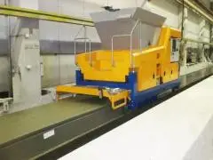 Machine for the production of hollow core slabs by extrusion
